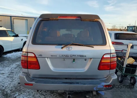 1999 Toyota Land Cruiser z USA, uszkodzony, nr VIN JT3HT05J4X0074693